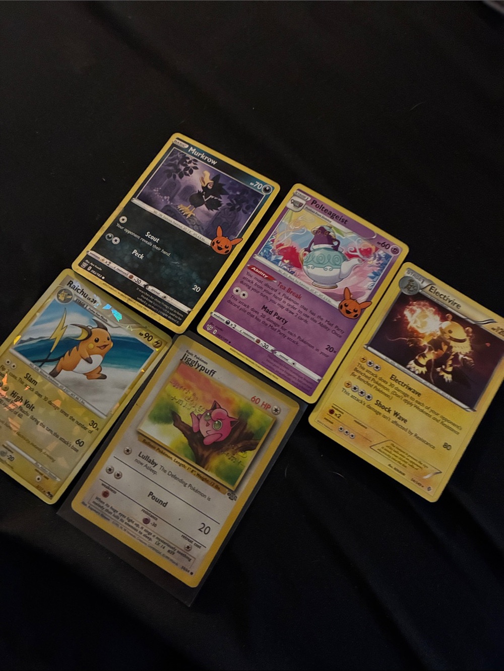 Five Pokémon cards